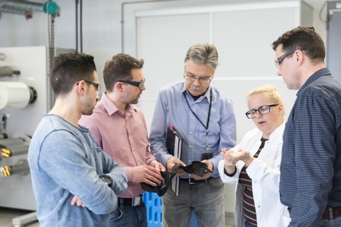 Evaluating coated material as a part of the practical training session at the PSA Academy