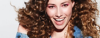 Women smiling with curly hair using Hair Gel Styling Gel