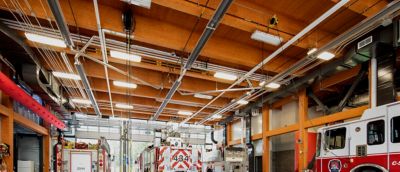 Interior of a fire station with a wood beam ceiling