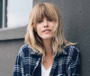 Blonde woman with bangs