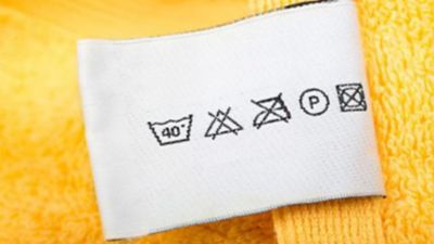 Geltono rankšluosčio priežiūros etiketė