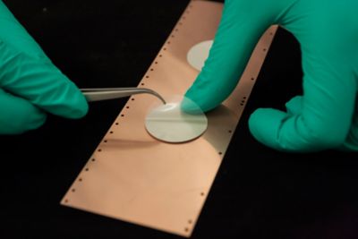 Gloved finger and tweezers life assembly film