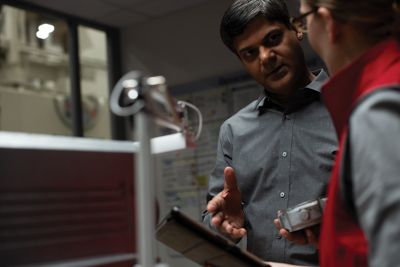 two people reviewing the results of an in-plant line survey