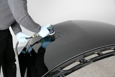 Repair a damaged car hood