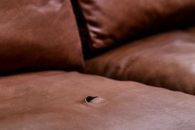 Ripped leather couch