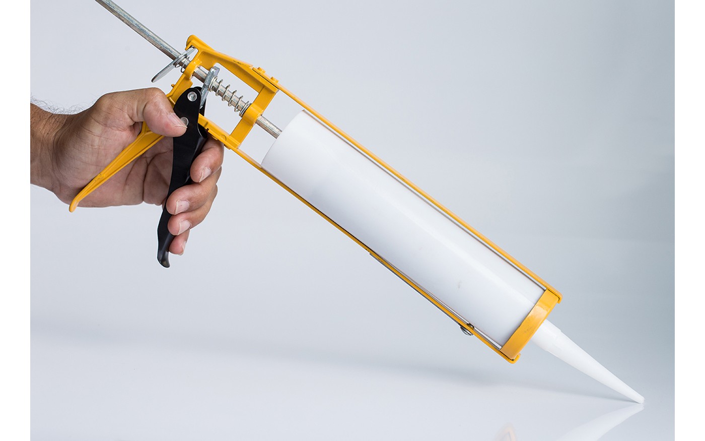 How to use a caulk gun