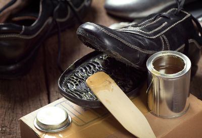 Dress shoes developed a sticky residue along the whole edge on