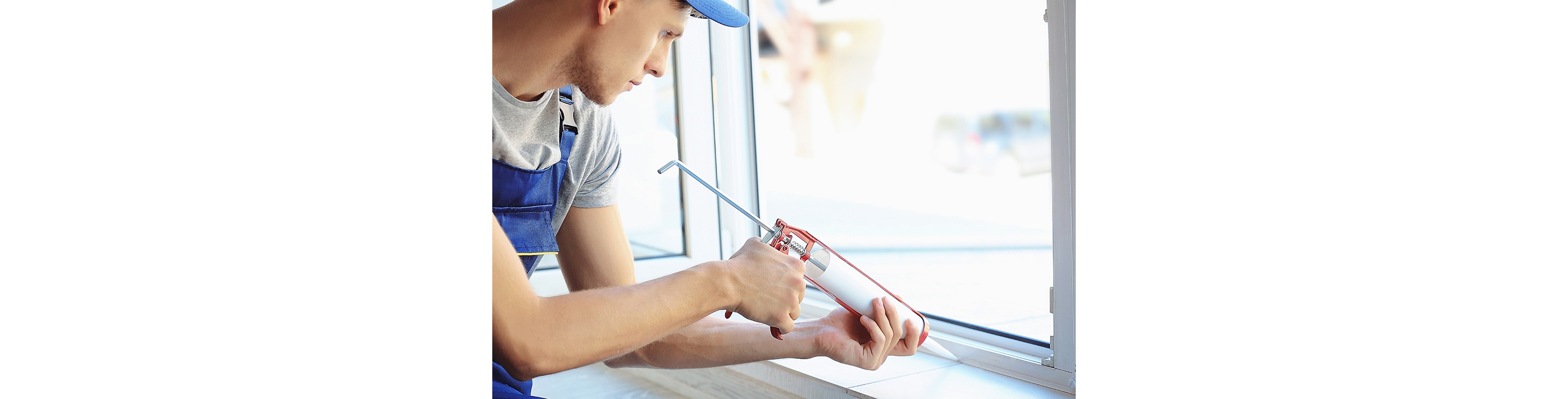 Silicone caulk on glass