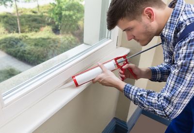 Window trim and caulking gun