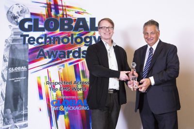 Photo of mark currie accepting global technology award for henkel ae at smt international conference recognizing bergquist peelable 1500rw gap filler liquid interface material as best new innovation