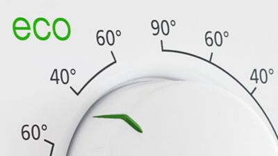 Detailansicht: Temperaturregler einer Waschmaschine mit Eco Funktion.