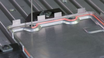 Pink Cured In Place (CIP) Gasket on Electronic Control Unit Housing