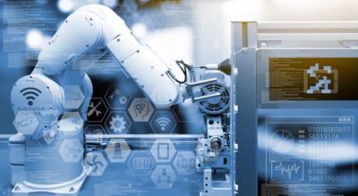 Photo of wireless robotic arm in a smart factory embellished with blue overtones and digital data  on the foreground of the image represents adhesive solutions for industrial automation shutterstock ID 495716128