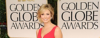 Stacey Keibler wears an elegant updo hairstyle with side fringe