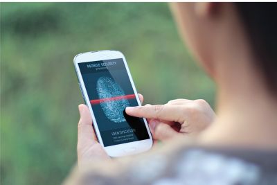 Modified shutterstock photo of woman touching the screen of a smartphone with fingeprint scanner running represents fingerpring sensor solutions for mobile handheld electronic devices shutterstock ID 212813140